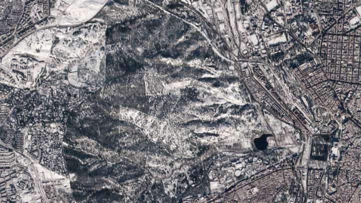 La Casa de Campo, desde el espacio. También se aprecia el Palacio Real y la Almudena / ESA, con licencia CC BY-SA 3.0 IGO