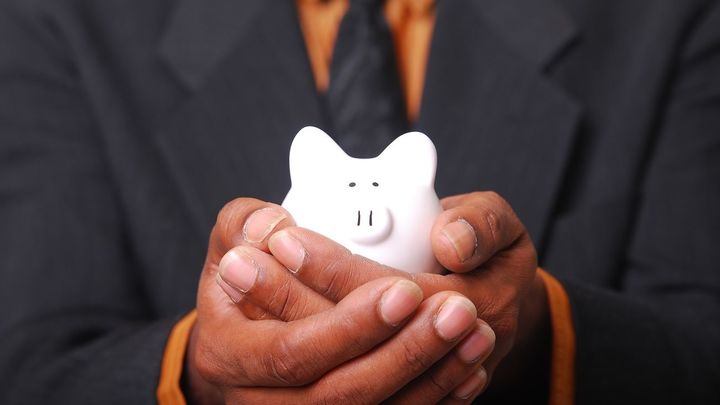 Tener dinero ahorrado para la hipoteca / Banco de imágenes