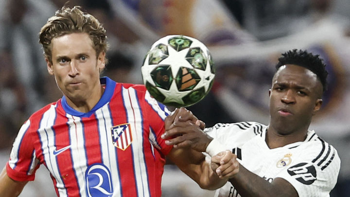 Marcos Llorente y Vinicius / EFE